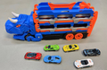 2-in-1 Dinosaur Mega Hauler Truck with Fold-Out Race Track | Kids Toy Car Carrier with Multi-Layer Storage & Die-Cast Racing Cars, Dinosaur Launcher Playset Gift for Boys Kids